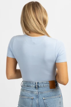 LE LIS NEW ARRIVALS SKY BLUE ROUNDNECK RIBBED BODYSUIT