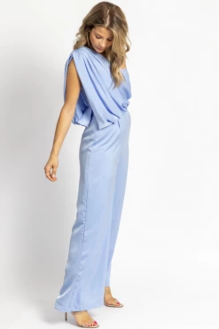 DO + BE BREEZE BLUE ONE SHOULDER DRAPE JUMPSUIT