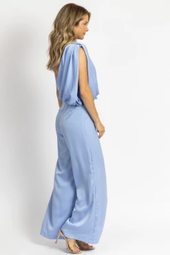 DO + BE BREEZE BLUE ONE SHOULDER DRAPE JUMPSUIT