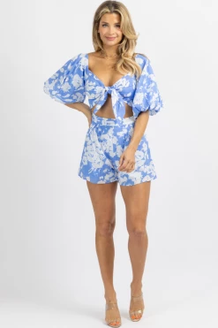 LUXXEL NEW ARRIVALS BRIGHT BLUE FLORAL PUFF SLEEVE ROMPER