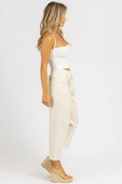 MABLE CREAM WOVEN ASYMMETRICAL BUTTON PANTS CLOTHING
