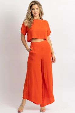 FORE COLLECTION TOMATO RED CROP + ASYMMETRIC HEM PANT SET