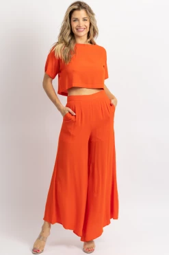 FORE COLLECTION TOMATO RED CROP + ASYMMETRIC HEM PANT SET