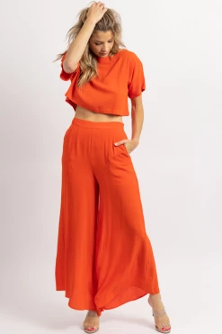 FORE COLLECTION TOMATO RED CROP + ASYMMETRIC HEM PANT SET