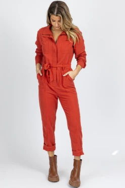 SKIES ARE BLUE NEW ARRIVALS DEEP RUST LONG SLEEVE UTILITY JUMPSUIT
