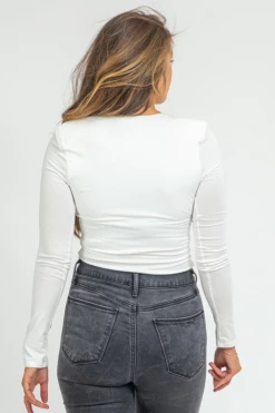 BLUE BLUSH CLOTHING IVORY V-NECK SHOULDER PAD BODYSUIT